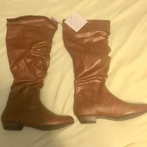 famous footwear fergalicious boots